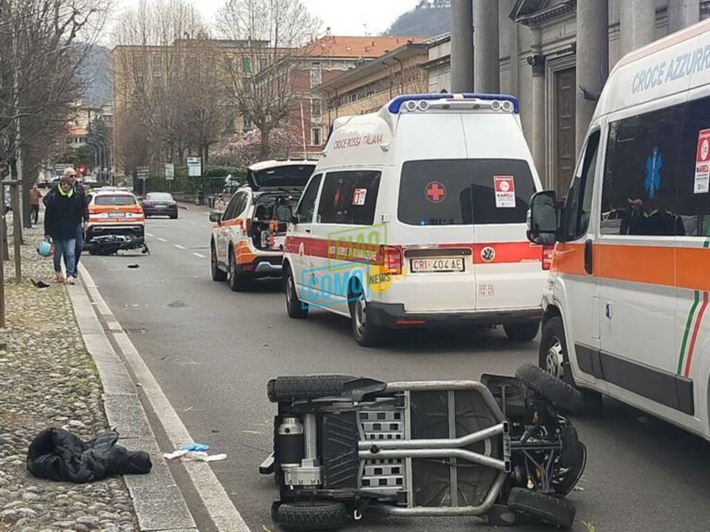 incidente viale varese como tra carrozzina elettrica e moto mezzi coinvolti rilievi vigili strada chiusa