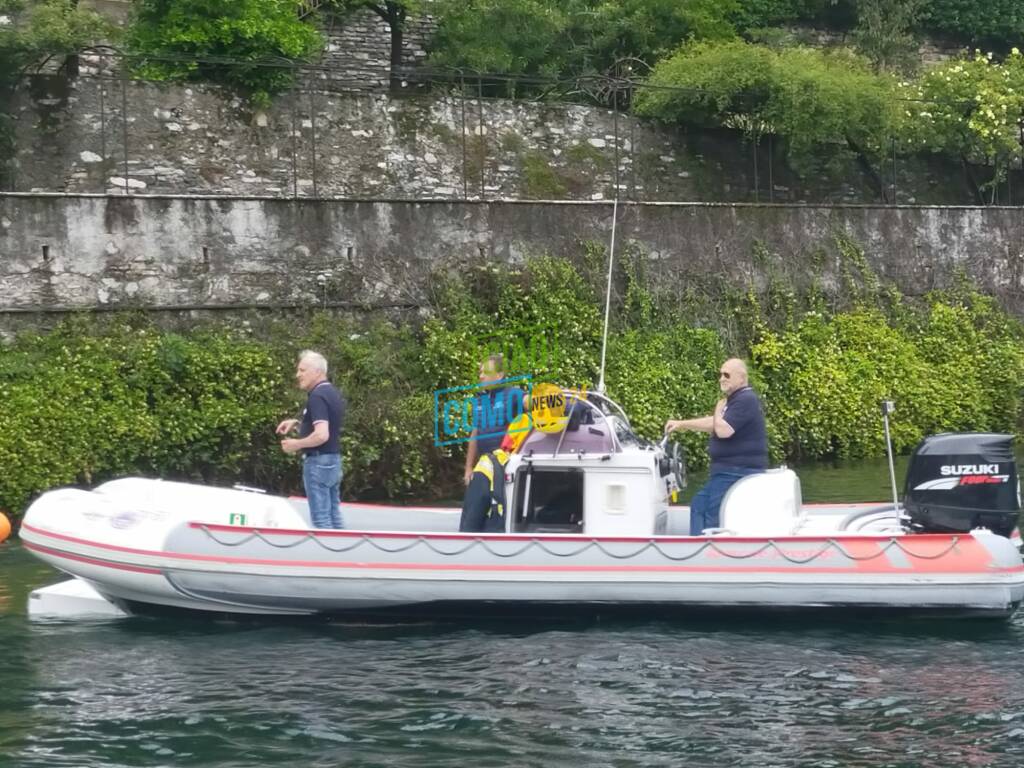 processione del lago cernobbio con evoluzione cielo e imbarcazioni presenti