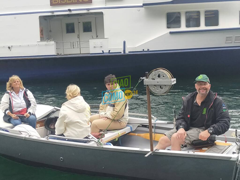 processione del lago cernobbio con evoluzione cielo e imbarcazioni presenti